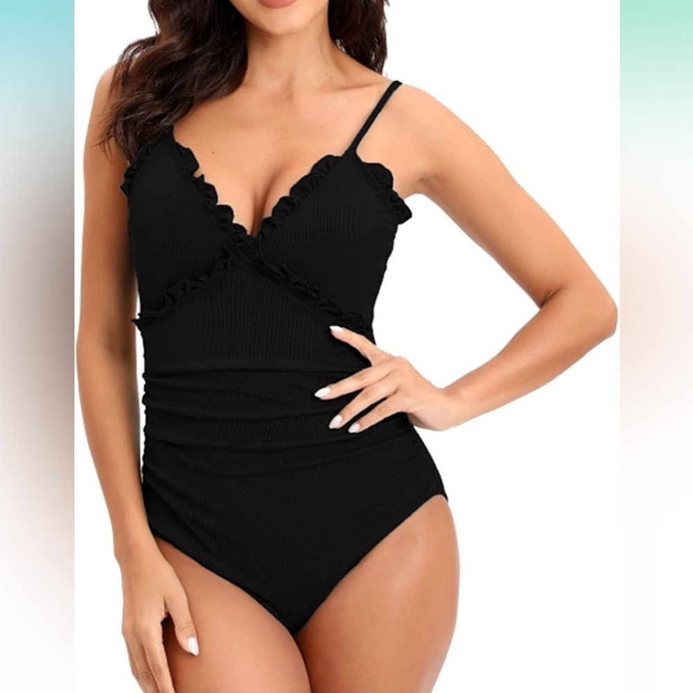 Elegant Black Ruffled 1 Piece Swimsuit
Full coverage Ruched tummy control 
NWT